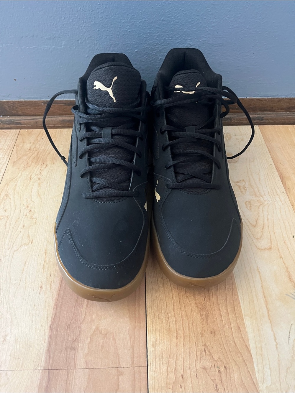 Puma Black Sneakers with Gum Sole and Gold Logo